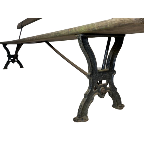 940 - Late 19th century J.P. Corry cast iron reversible railway bench. 275cm.