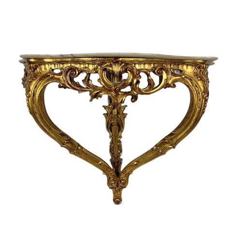 944 - 18th century style ornate gilt onyx top console table in the rococo style. 87x33x70cm