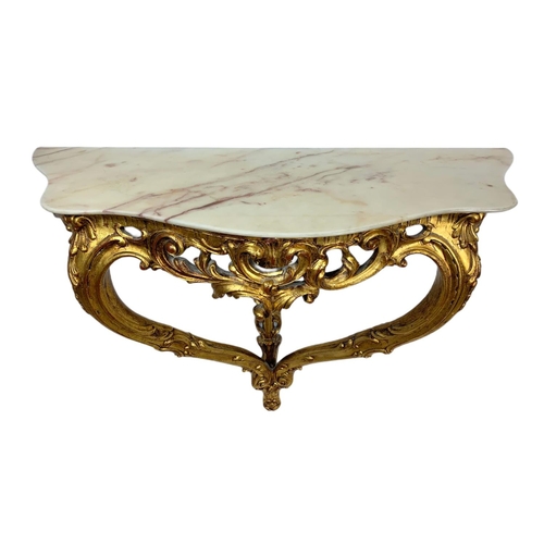 944 - 18th century style ornate gilt onyx top console table in the rococo style. 87x33x70cm