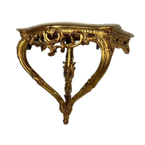 944 - 18th century style ornate gilt onyx top console table in the rococo style. 87x33x70cm