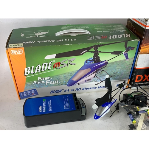 203F - DX5e Spektrum Aircraft System remote in box and a Blade MSR helicopter in box