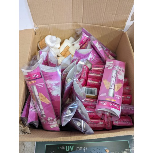 734 - Large quantity of UV lamps and other nail products