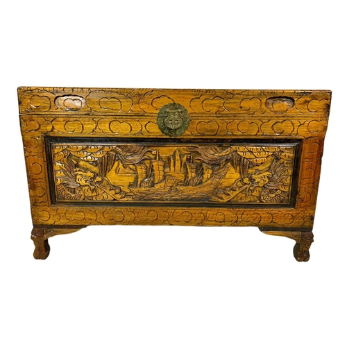 1036 - Ornate carved trunk. 100/50/61cm