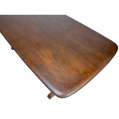 1038 - Large Ercol mid century dining table. 181x83x73cm