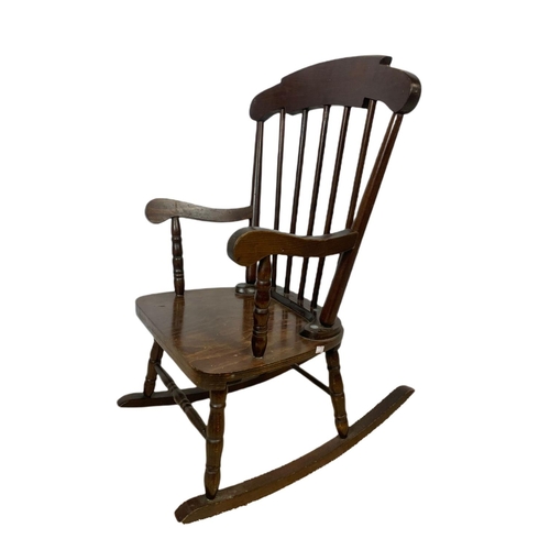 1039 - Small vintage rocking chair with an early 20th century copper fire screen