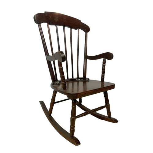 1039 - Small vintage rocking chair with an early 20th century copper fire screen