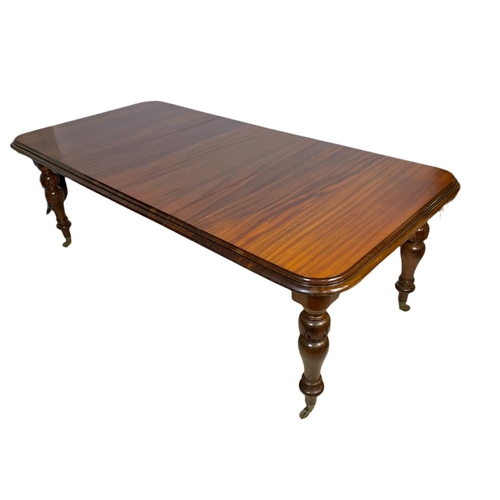 1050 - Victorian mahogany extendable 2 leaf dining table. Fully extended 216x105x74cm