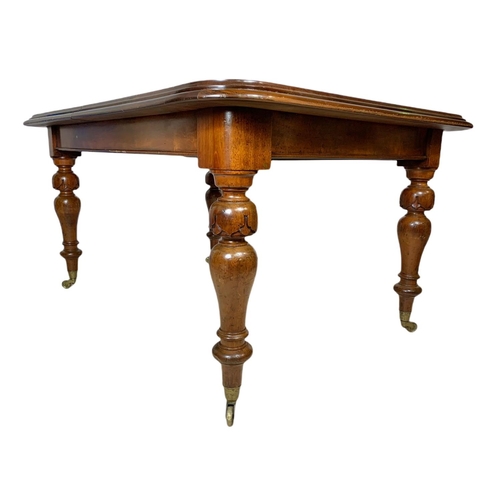 1050 - Victorian mahogany extendable 2 leaf dining table. Fully extended 216x105x74cm