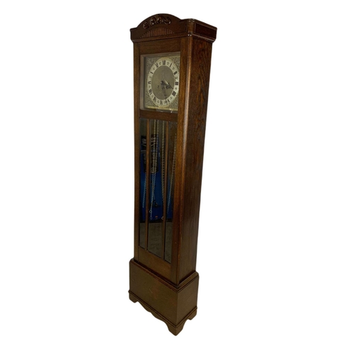 1068 - Early 20th century walnut long case clock. Circa 1930’s. 42/21/172cn.