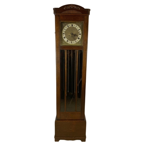 1068 - Early 20th century walnut long case clock. Circa 1930’s. 42/21/172cn.