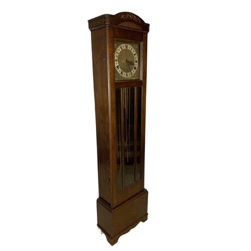 1068 - Early 20th century walnut long case clock. Circa 1930’s. 42/21/172cn.