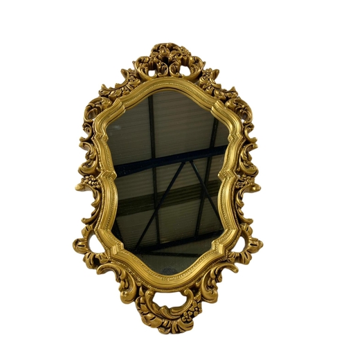 337 - Vintage 18th century style ornate gilt framed mirror. 43x73.5cm