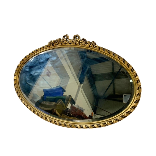 338 - Vintage gilt framed bevelled mirror. 72x48cm