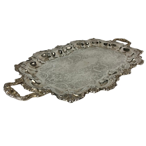 504 - Large early 20th century silver plated serving tray. 67/37cm