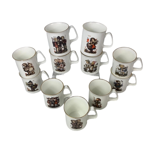 505 - 11 Goebel pottery mugs.