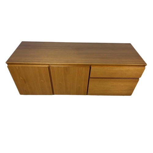 980 - Danish teak mid century sideboard designed by Johannes Andersen for Uldum Interiors 
140x48.5x56.5cm... 