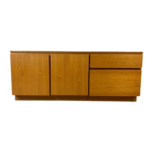 980 - Danish teak mid century sideboard designed by Johannes Andersen for Uldum Interiors 
140x48.5x56.5cm... 