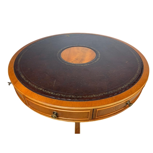 984 - Large Georgian style yew wood leather top drum table with 4 drawers. 94x57cm