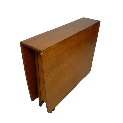 989 - McIntosh teak mid century drop leaf dining table. Extended 150x91.5x74cm