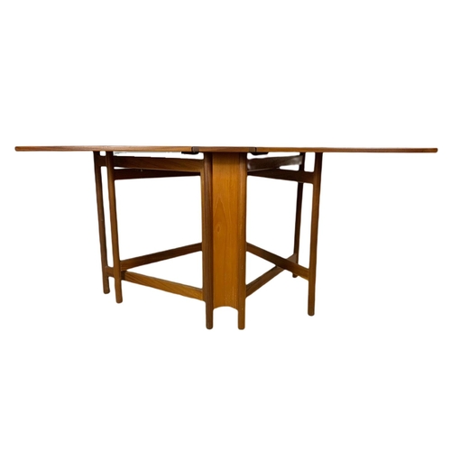 989 - McIntosh teak mid century drop leaf dining table. Extended 150x91.5x74cm