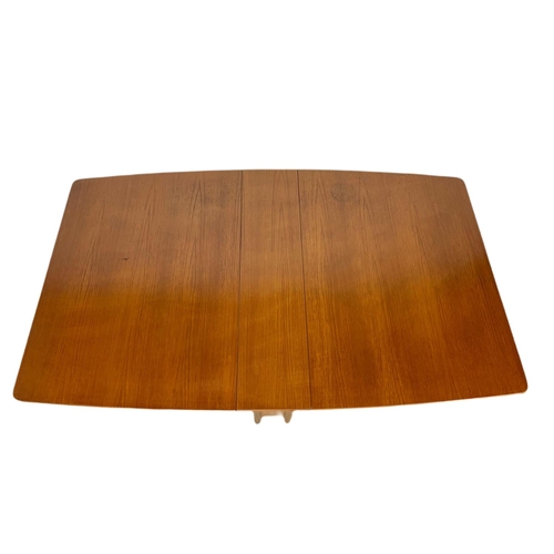 989 - McIntosh teak mid century drop leaf dining table. Extended 150x91.5x74cm