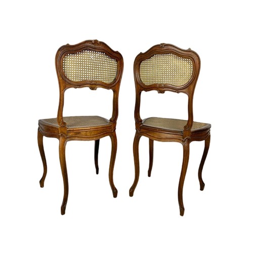 826 - Pair of late 19th century gilt French inlaid carved walnut side chairs with bergère back and seats.