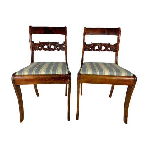 923 - Pair of 19th century mahogany continental sabre leg side chairs.