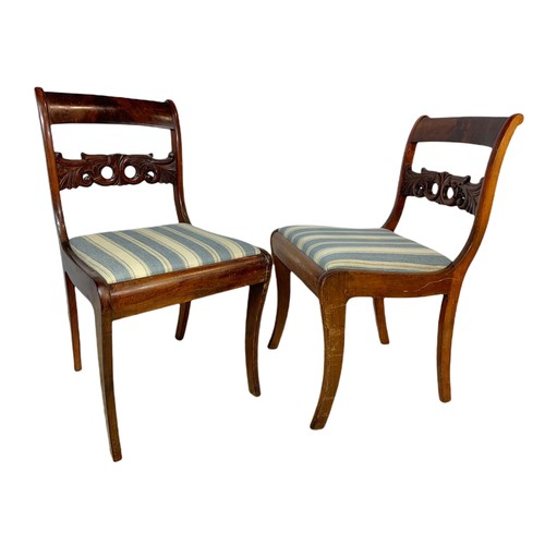 923 - Pair of 19th century mahogany continental sabre leg side chairs.