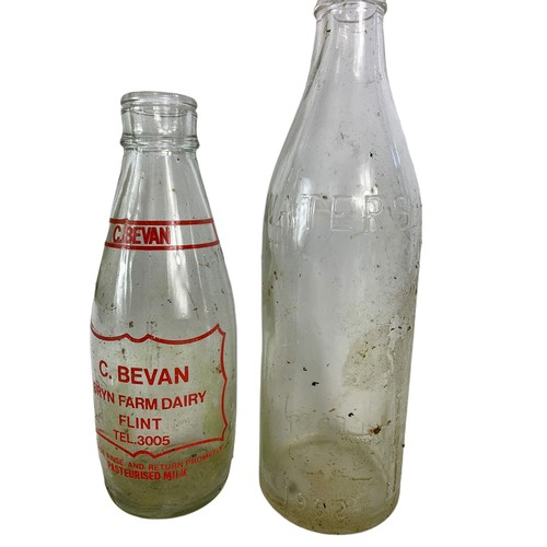 353 - 7 vintage glass bottles. Largest 28.5cm