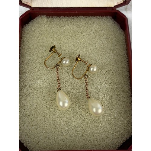 636 - Pair of 9ct gold pearl stone earrings