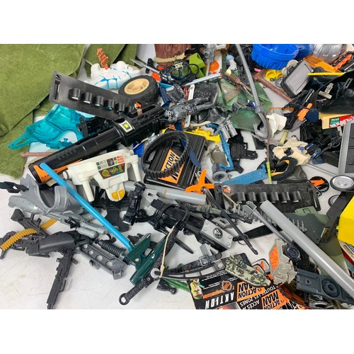 203j - Large quantity of Action Man guns, clothes and other accessories.