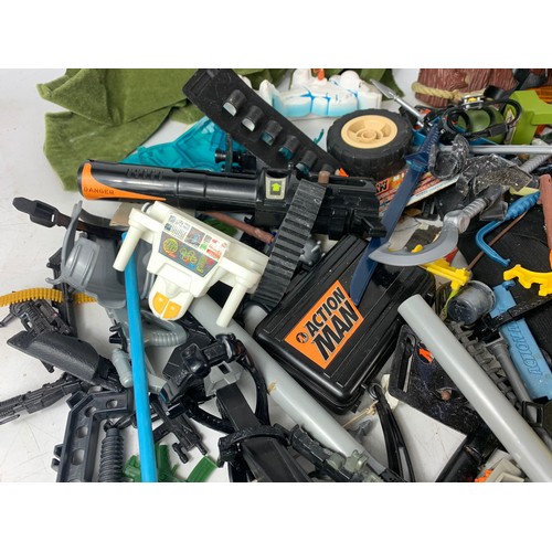 203j - Large quantity of Action Man guns, clothes and other accessories.