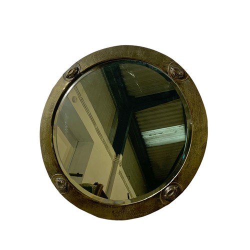 1049 - Early 20th century Arts & Crafts brass framed mirror. 53.5cm