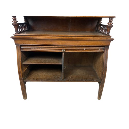 966 - Late Victorian oak fall front desk with roller shutter door compartment with brass mounts. 70x26x120... 