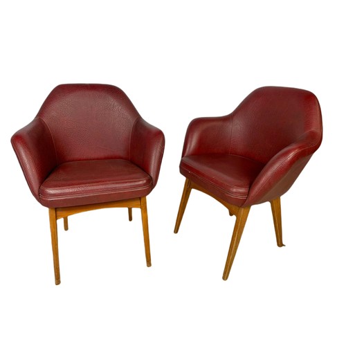 1012 - Pair of mid century Scandinavian design beech framed armchairs in burgundy vinyl