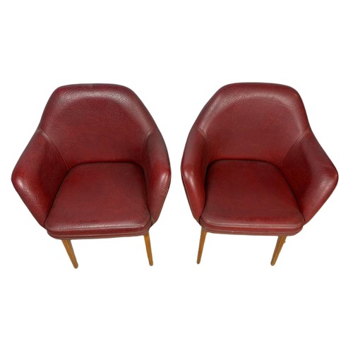 1012 - Pair of mid century Scandinavian design beech framed armchairs in burgundy vinyl