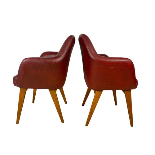 1012 - Pair of mid century Scandinavian design beech framed armchairs in burgundy vinyl