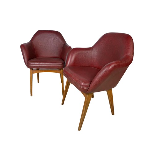 1012 - Pair of mid century Scandinavian design beech framed armchairs in burgundy vinyl