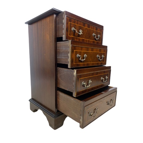 1028 - Small Georgian style inlaid mahogany chest of drawers. 45.5x35.5x69cm