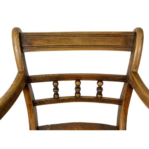 1027 - 19th century elm country house armchair.