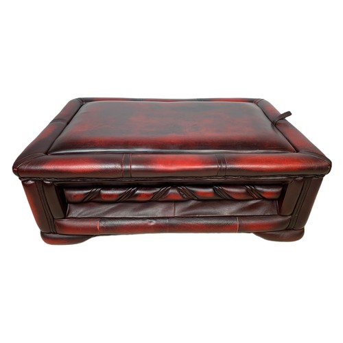 1026 - Ox blood leather storage stool. 76/50/28cm