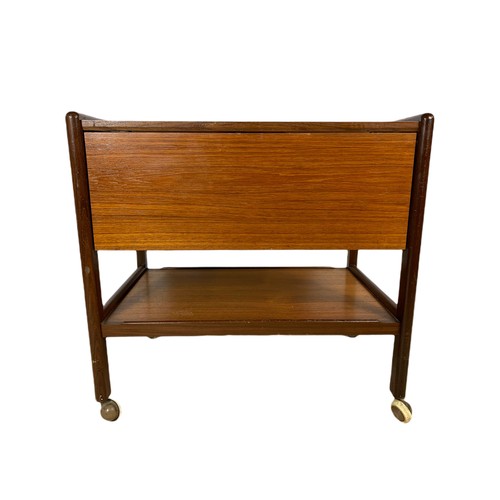 1051 - Teak mid century 2 tier drop leaf serving trolley. 87/69/66cm.