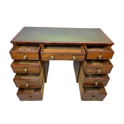 972 - Late Georgian mahogany leather top kneehole desk. 117x51.5x79.5cm