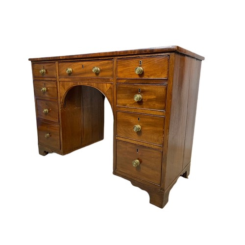 972 - Late Georgian mahogany leather top kneehole desk. 117x51.5x79.5cm