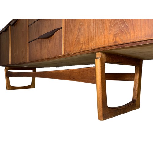 973 - Teak mid century sideboard by William Lawrence. 192.5x43x73.5cm