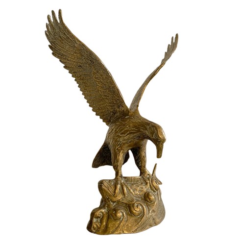 604 - 2 vintage brass eagles. Largest 44cm