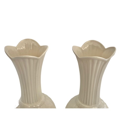 429a - Pair of Belleek pottery vases. 22.5cm