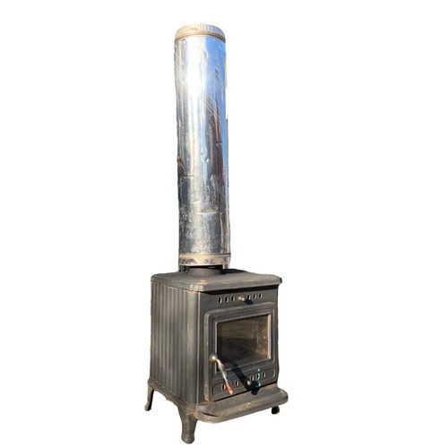 31a - Cast iron wood burning stove. Base measures 44x45x55cm