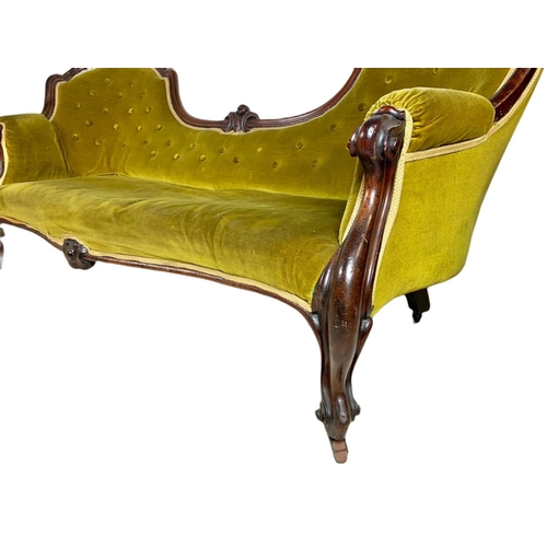 1059 - Victorian double end couch on cabriole legs. 190cm