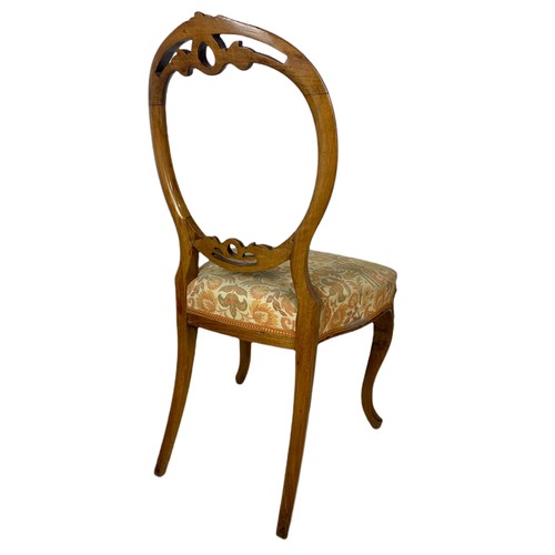 1077 - Pair of Victorian walnut balloon back side chairs.